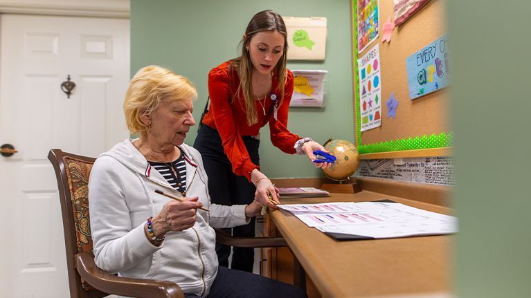 Masonicare resident at teacher station 