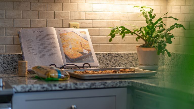 Baked dessert next to open recipe book